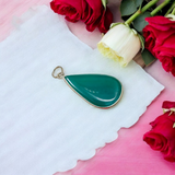A close-up view of the Original Green Emerald Penna Pendant, showcasing the lab-certified green emerald gemstone, perfect for enhancing emotional wellbeing.