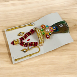 A complete Laddu Gopal Shringaar Set featuring Mukut, Bangle, Mala, Earrings, Bansuri, and Bindi to adorn Krishna idols.