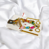 A complete Laddu Gopal Shringaar Set including Mukut, Earrings, Bangles, Mala, and Bansuri for adorning Krishna idols.