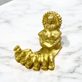 A detailed brass statue of Lord Surya riding a chariot, symbolizing vitality, health, and prosperity, crafted with intricate features and a polished finish.
