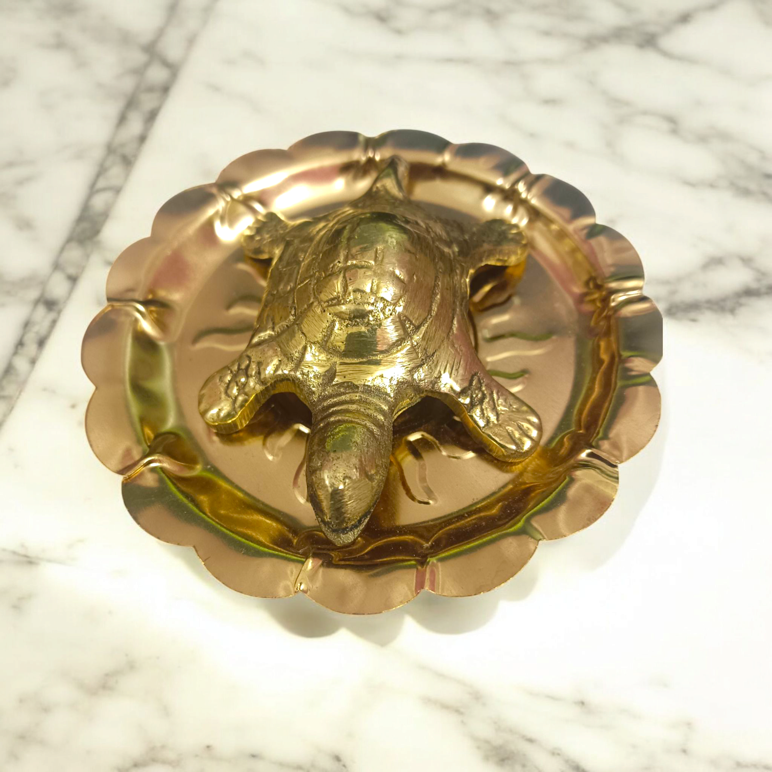 A detailed image of the Brace Kachua with Yantra, showcasing the tortoise shape and intricate Yantra design etched onto it, symbolizing prosperity, protection, and wish fulfillment.

