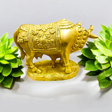 A divine Kamdhenu Cow with Her Child Brass Murti, perfect for worship and pooja, symbolizing prosperity, abundance, and blessings.
