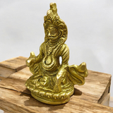 A finely crafted brass statue of Lord Kuber, the god of wealth and prosperity, symbolizing abundance and financial success.