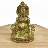 A finely crafted brass statue of Lord Kuber, the god of wealth and prosperity, symbolizing abundance and financial success.