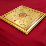 A gold-plated Shri Sarv Kasht Nivaran Yantra Raj, framed beautifully, symbolizing the removal of obstacles and promoting peace and prosperity