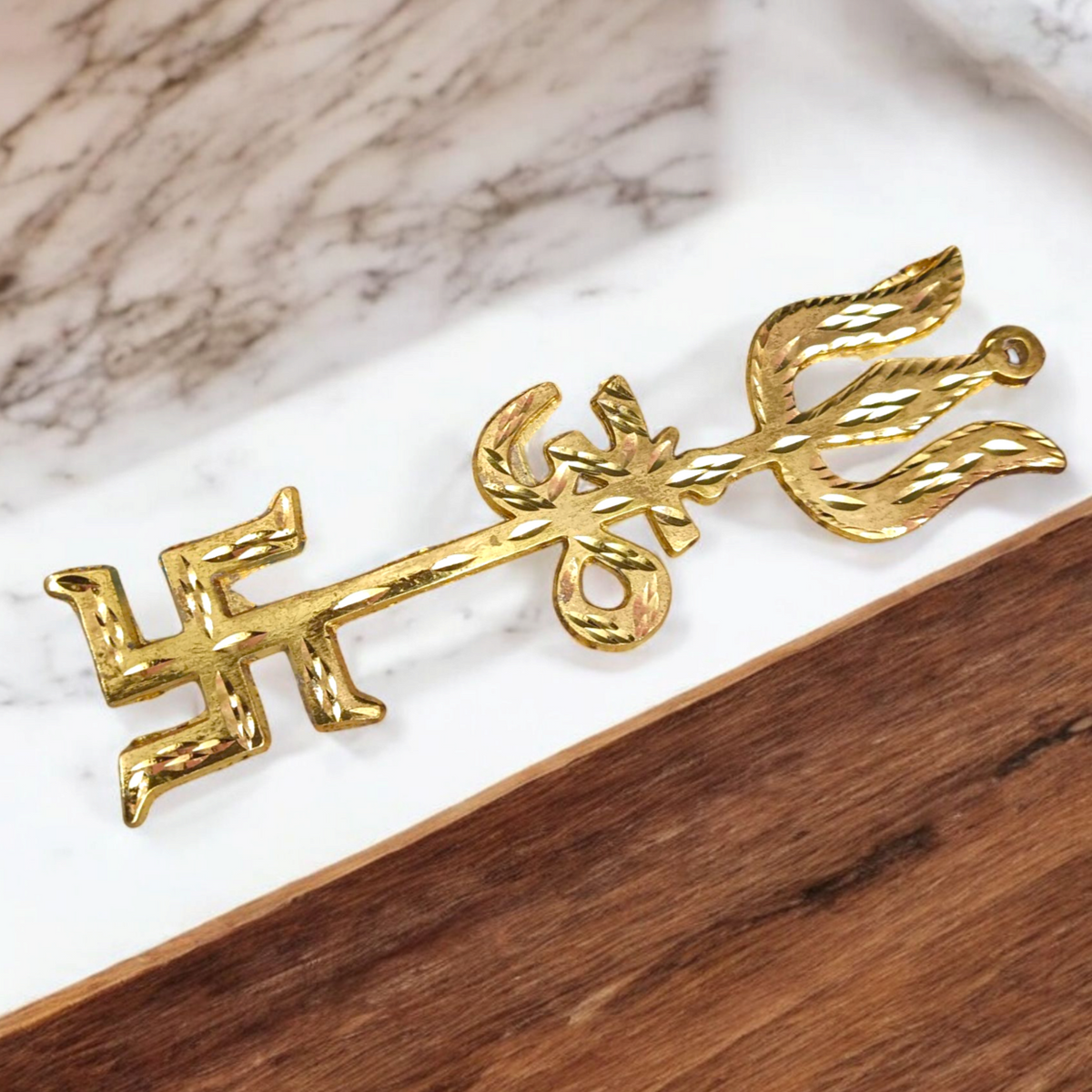 A gold-plated Trishakti wall hanging, designed to invoke protection, prosperity, and spiritual growth in your home or office