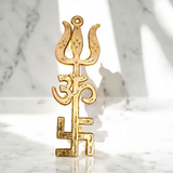 A gold-plated Trishakti wall hanging, designed to invoke protection, prosperity, and spiritual growth in your home or office