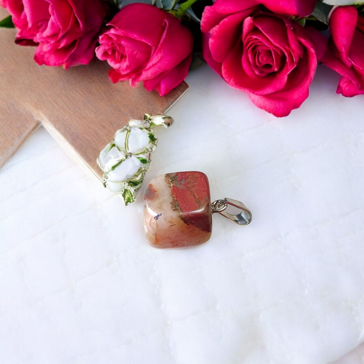 A handcrafted Rainbow Red Jasper Pendant made from natural tumbled gemstone, perfect for healing, emotional stability, and protection