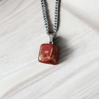 A handcrafted Rainbow Red Jasper Pendant made from natural tumbled gemstone, perfect for healing, emotional stability, and protection