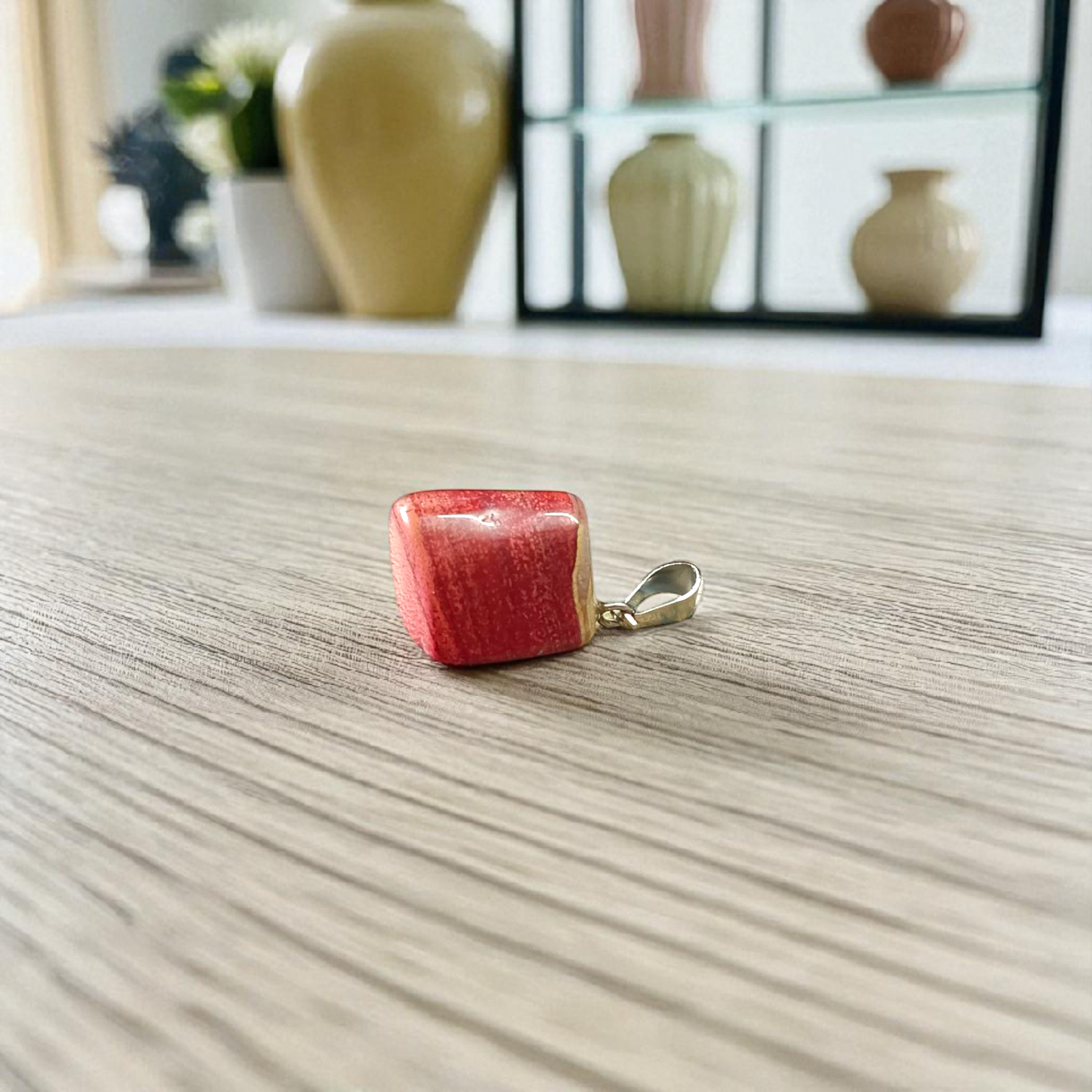 A handcrafted Rainbow Red Jasper Pendant made from natural tumbled gemstone, perfect for healing, emotional stability, and protection