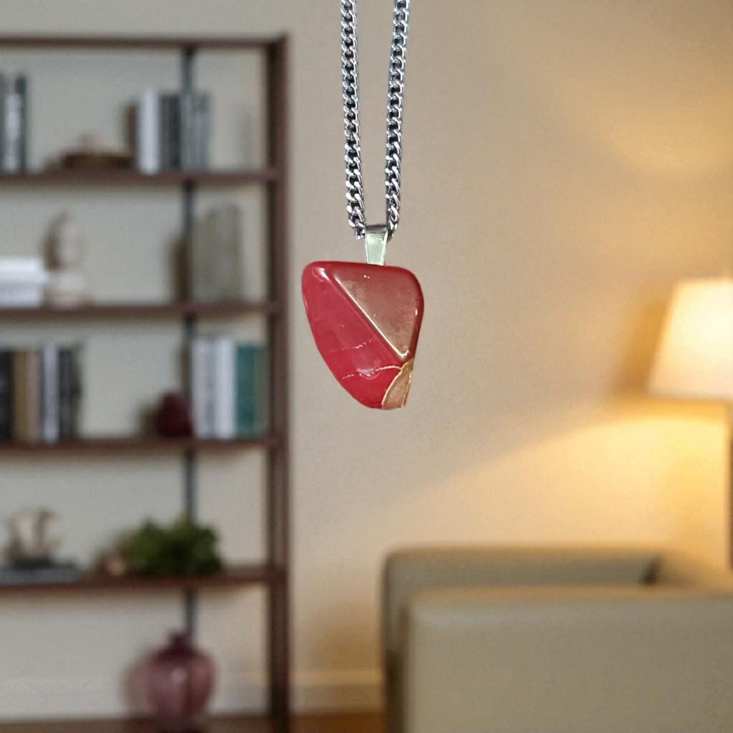 A handcrafted Rainbow Red Jasper Pendant made from natural tumbled gemstone, perfect for healing, emotional stability, and protection