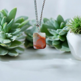 A handcrafted Rainbow Red Jasper Pendant made from natural tumbled gemstone, perfect for healing, emotional stability, and protection