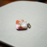 A handcrafted Rainbow Red Jasper Pendant made from natural tumbled gemstone, perfect for healing, emotional stability, and protection
