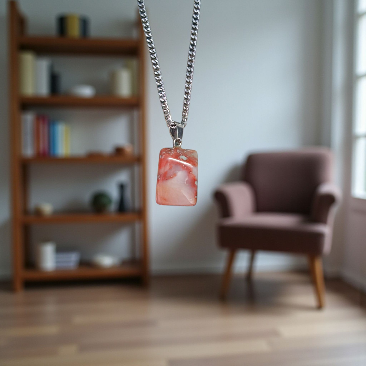 A handcrafted Rainbow Red Jasper Pendant made from natural tumbled gemstone, perfect for healing, emotional stability, and protection