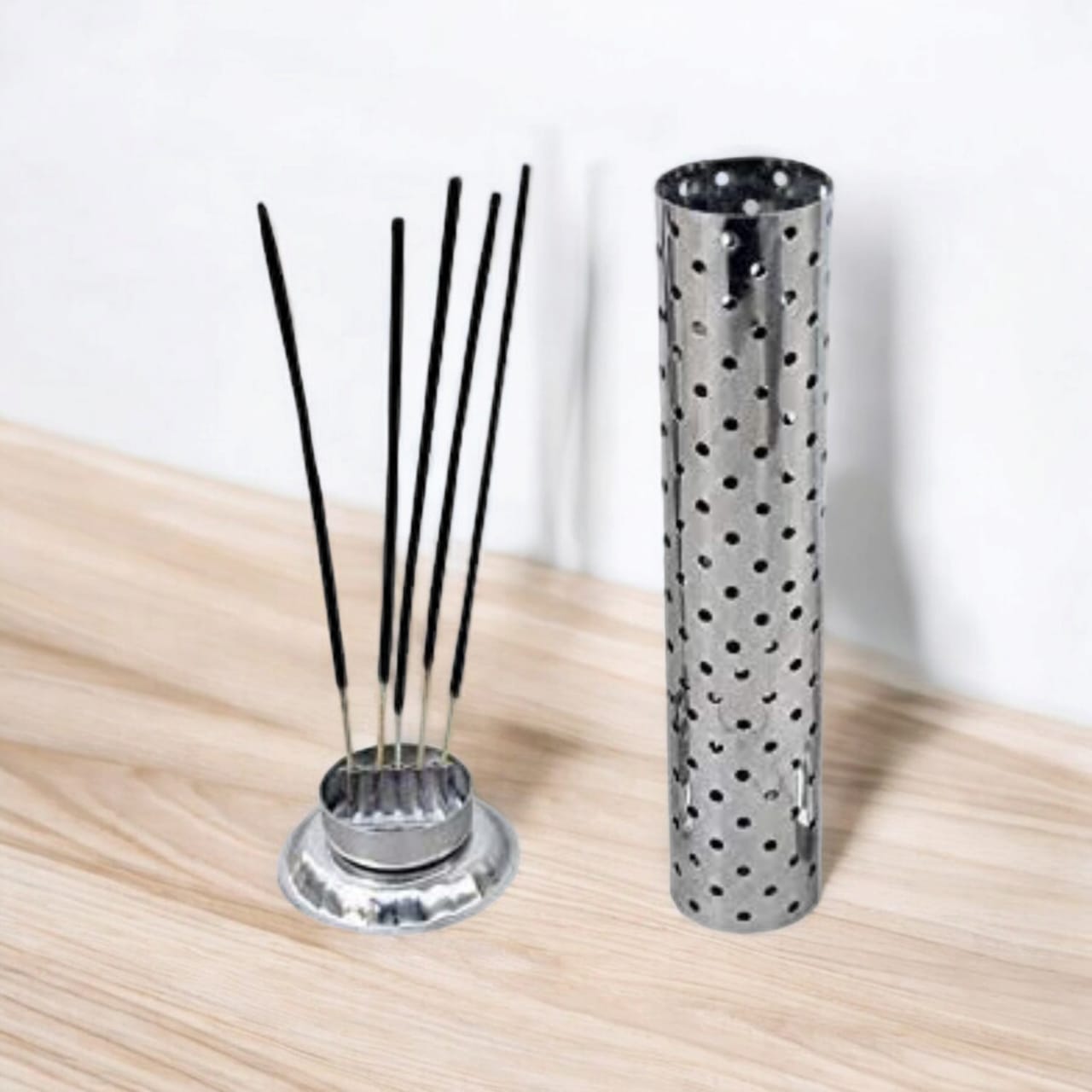 A high-quality Agarbatti stand with an ash catcher, holding incense sticks securely in place with a soothing aroma from the included Agarbatti.