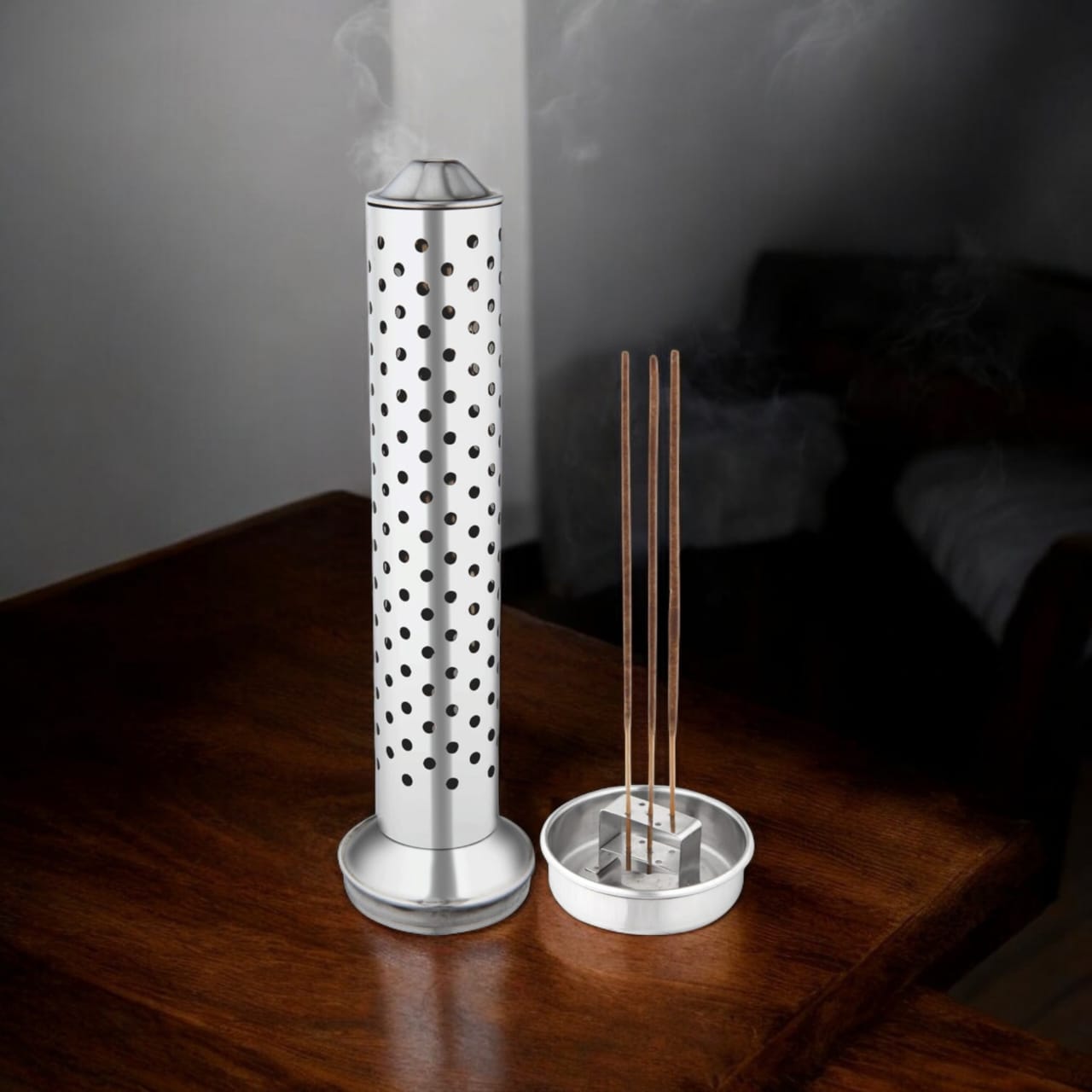 A high-quality Agarbatti stand with an ash catcher, holding incense sticks securely in place with a soothing aroma from the included Agarbatti.
