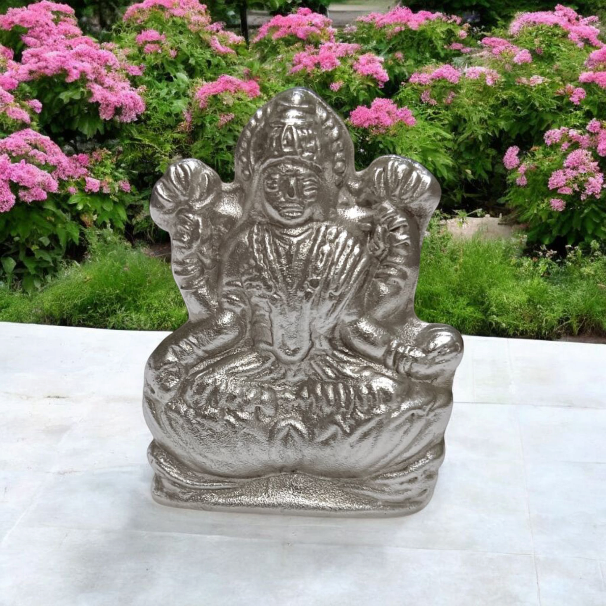 A high-quality image of a Lakshmi Ganesh In Parad Murti, crafted from pure mercury, symbolizing prosperity, wealth, and success, with intricate detailing and lab certification