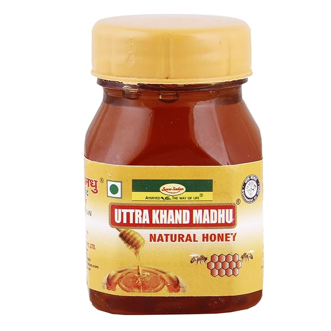A jar of 25-gram honey for worship use, symbolizing purity and devotion in pooja rituals