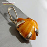 A lab-certified natural Machh Mani gemstone set in a pure silver pendant, offering spiritual and astrological benefits.