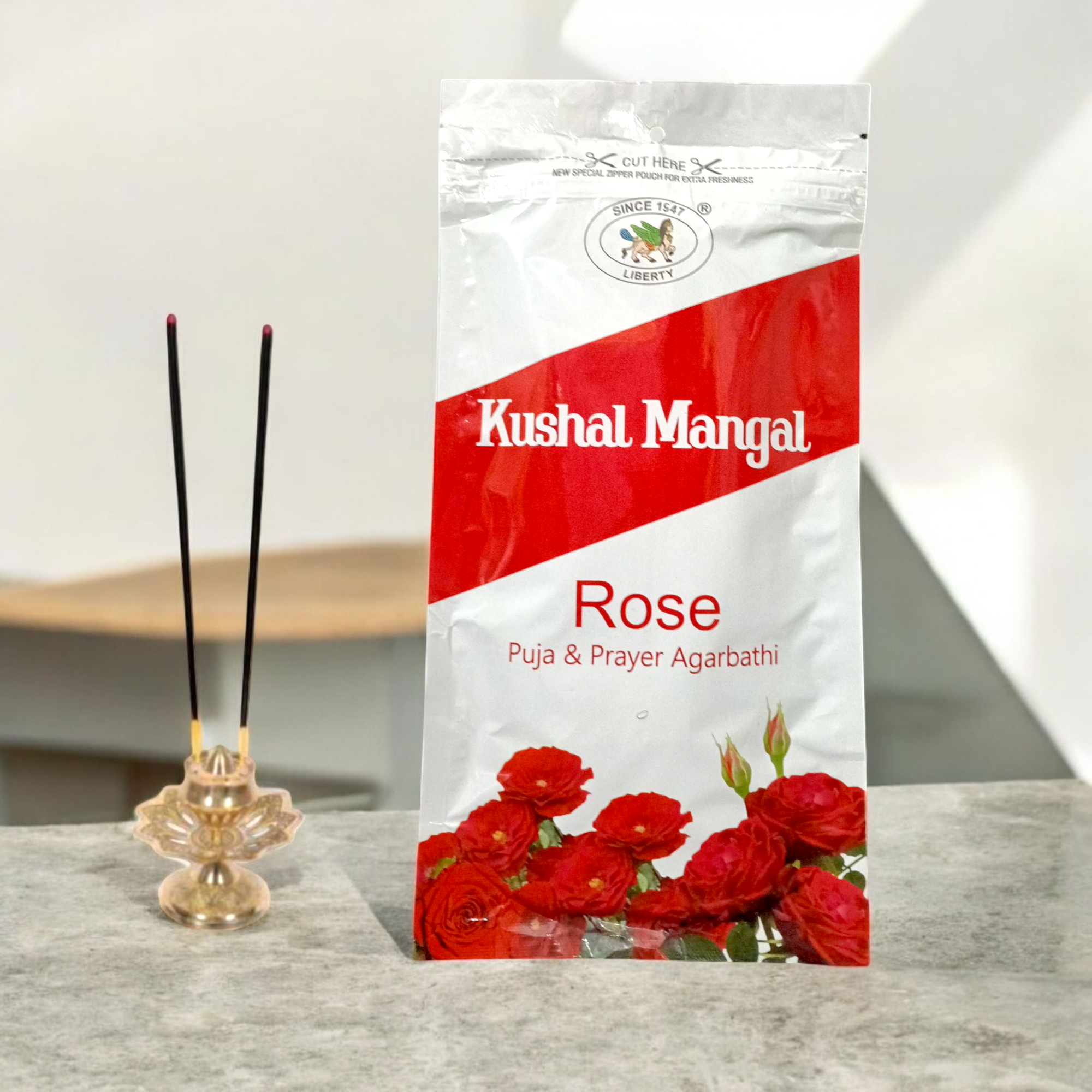 A pack of Kushal Mangal Rose Incense Sticks with a calming rose fragrance, perfect for meditation, relaxation, and creating a peaceful atmosphere.