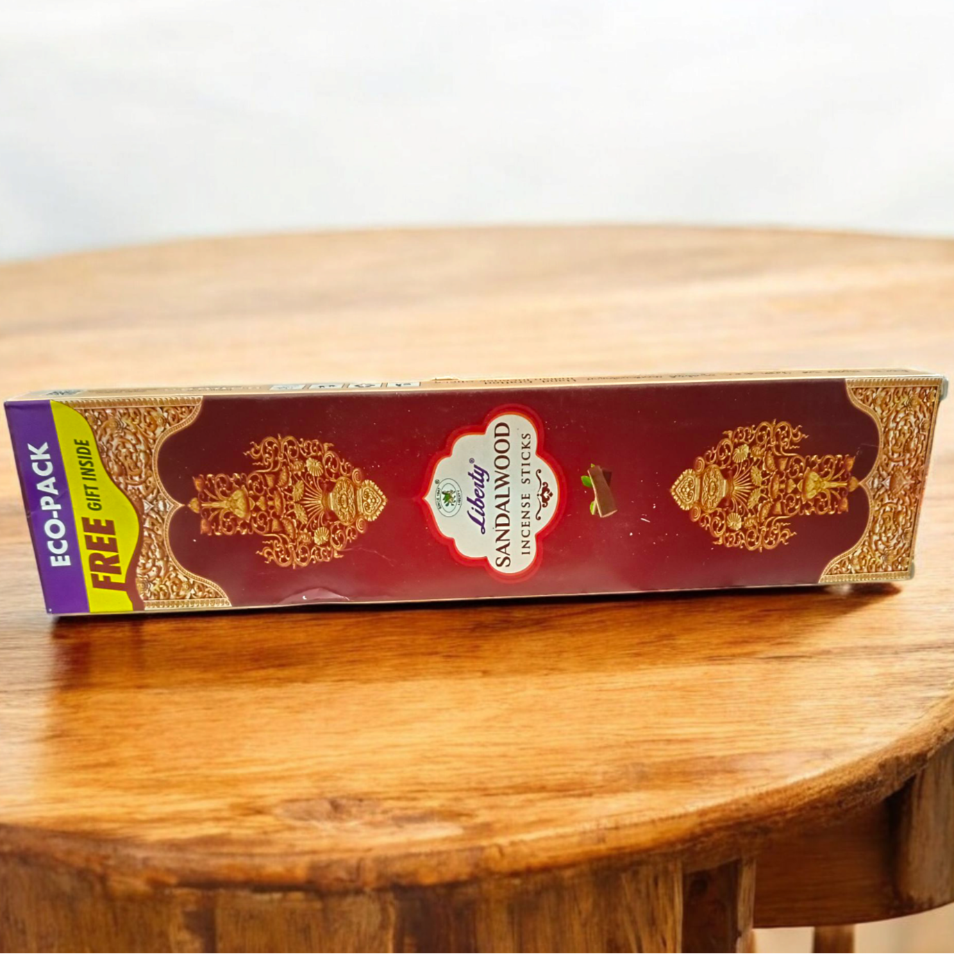 A pack of Sandalwood Incense Sticks with a calming aroma, featuring an economy-sized bundle with a free gift included.