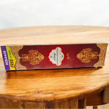 A pack of Sandalwood Incense Sticks with a calming aroma, featuring an economy-sized bundle with a free gift included.