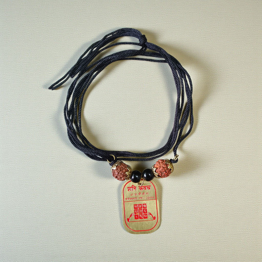 A powerful and lab-certified Divya Shani Dosh Nivaran Kawach, energized for protection against Saturn’s negative effects and designed to bring peace, prosperity, and balance