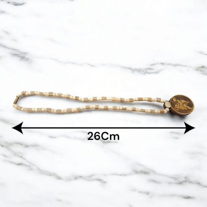 A sacred Hanuman Ji Locket embedded in a traditional Tulsi Mala, symbolizing strength, protection, and devotion to Lord Hanuman