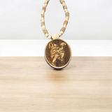 A sacred Hanuman Ji Locket embedded in a traditional Tulsi Mala, symbolizing strength, protection, and devotion to Lord Hanuman