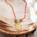 A sacred Mahamritunjay Kawach Protection Locket featuring the divine Mahamrityunjaya Mantra, symbolizing Lord Shiva's blessings and protection