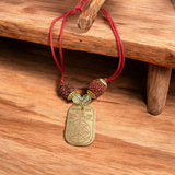 A sacred Mahamritunjay Kawach Protection Locket featuring the divine Mahamrityunjaya Mantra, symbolizing Lord Shiva's blessings and protection