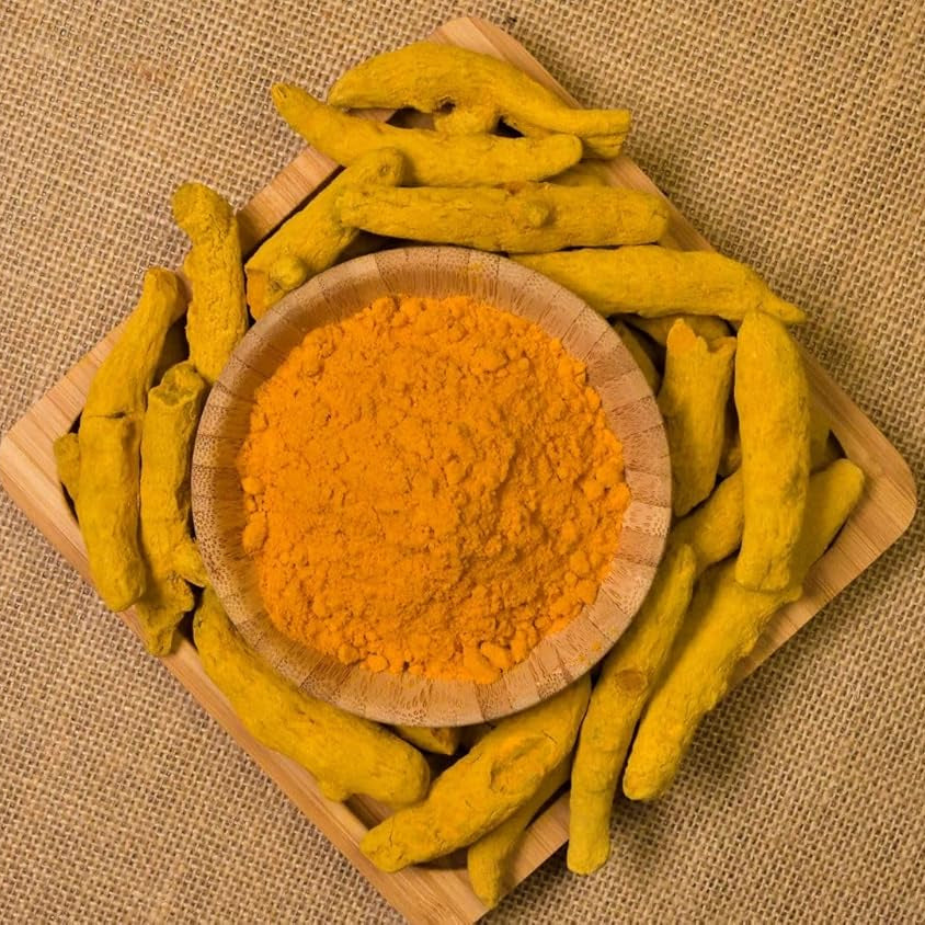 A set of 10 whole yellow turmeric roots (Sabut Haldi) used for health remedies, skin care, and spiritual rituals, offering natural healing benefits.