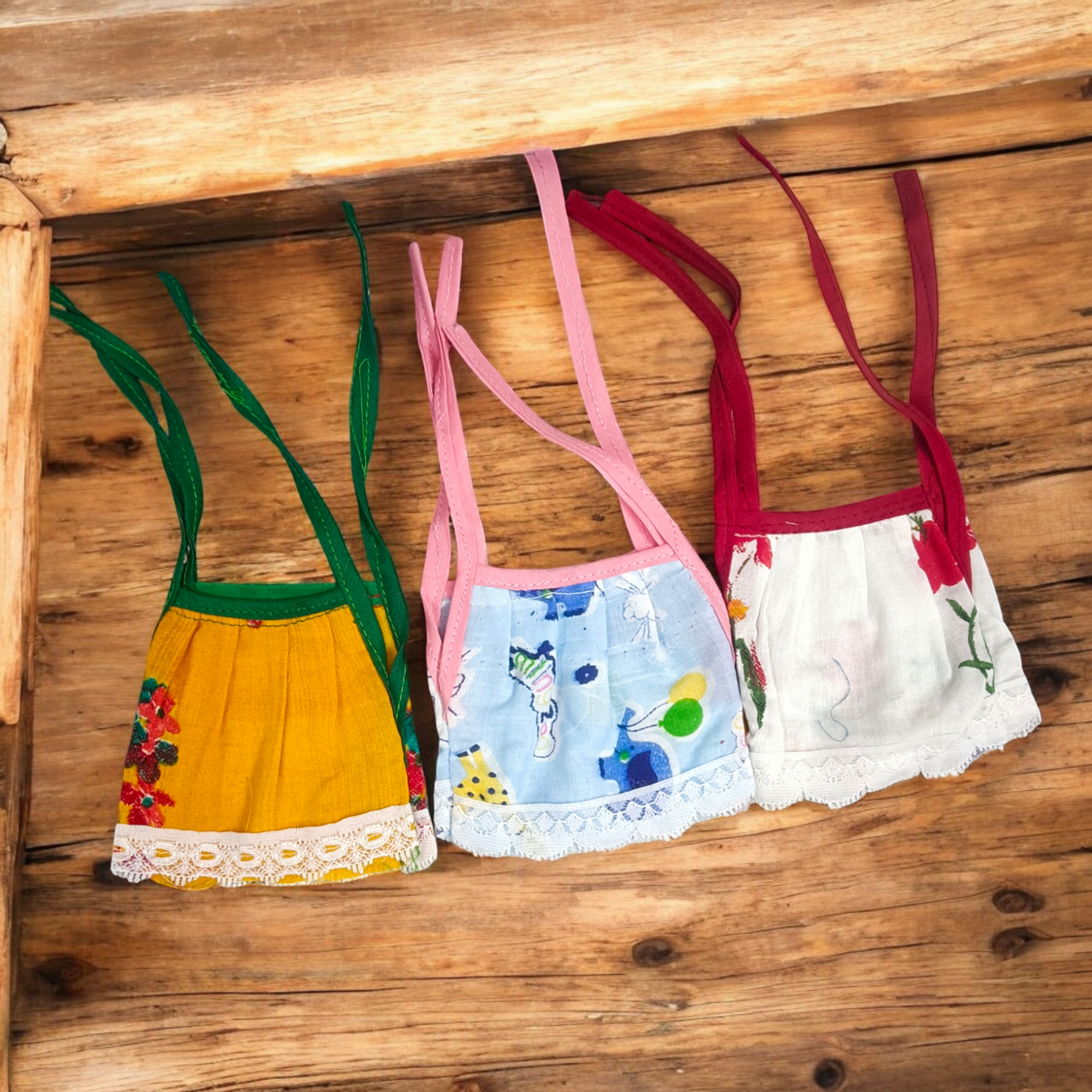 A set of 3 Laddu Gopal Jhabla dresses designed for 2-3 No. size Laddu Gopal idols, made from soft cotton fabric