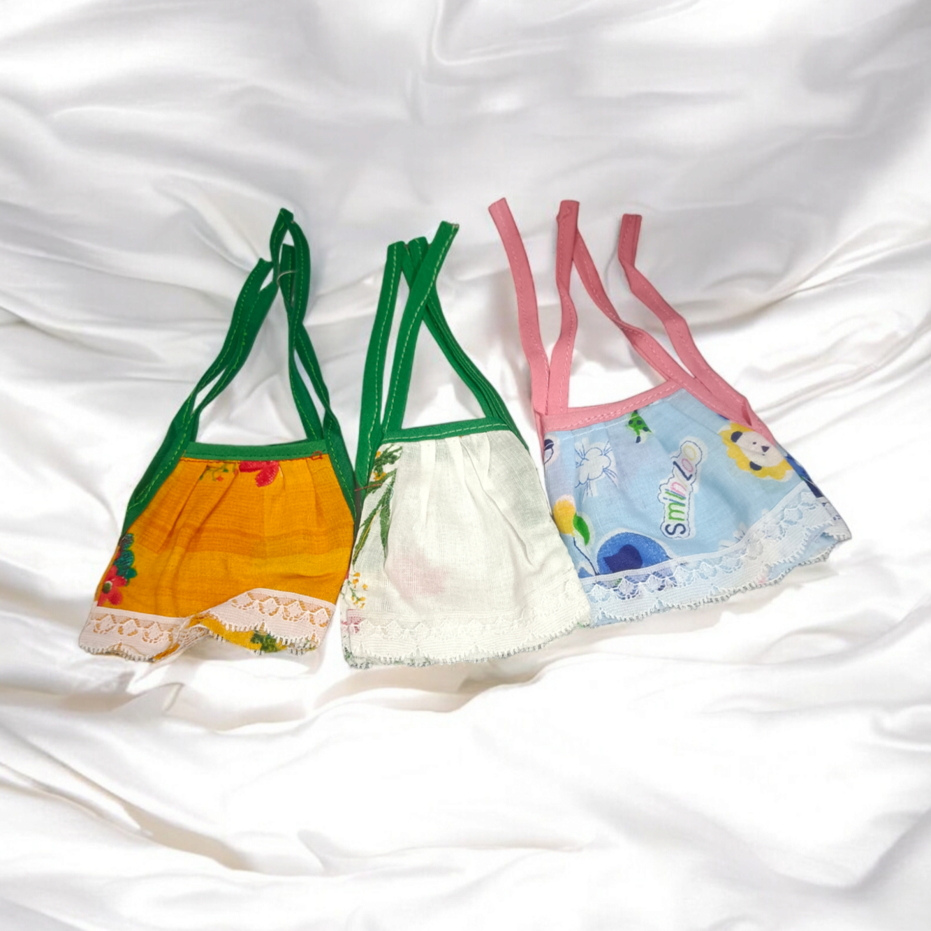 A set of 3 Laddu Gopal Jhabla dresses designed for 2-3 No. size Laddu Gopal idols, made from soft cotton fabric.