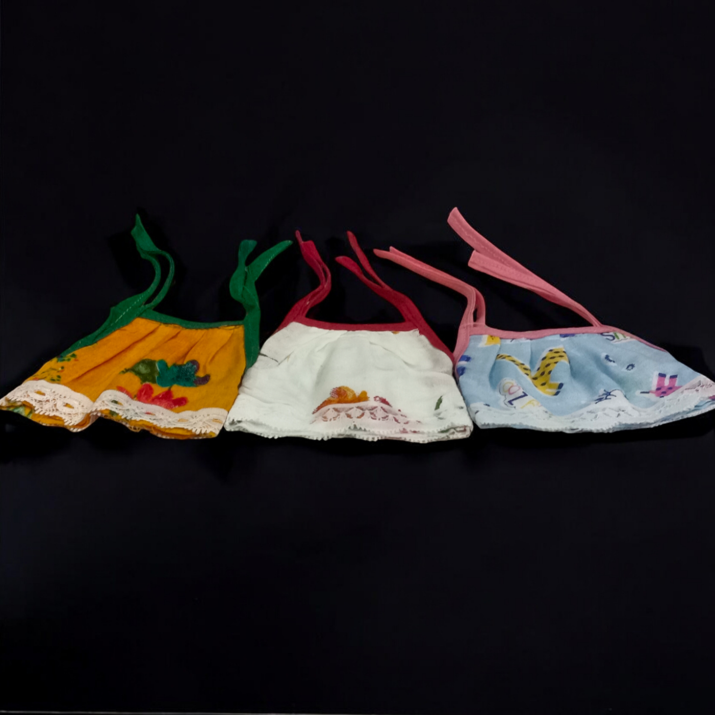 A set of 3 Laddu Gopal Jhabla dresses designed for 2-3 No. size Laddu Gopal idols, made from soft cotton fabric