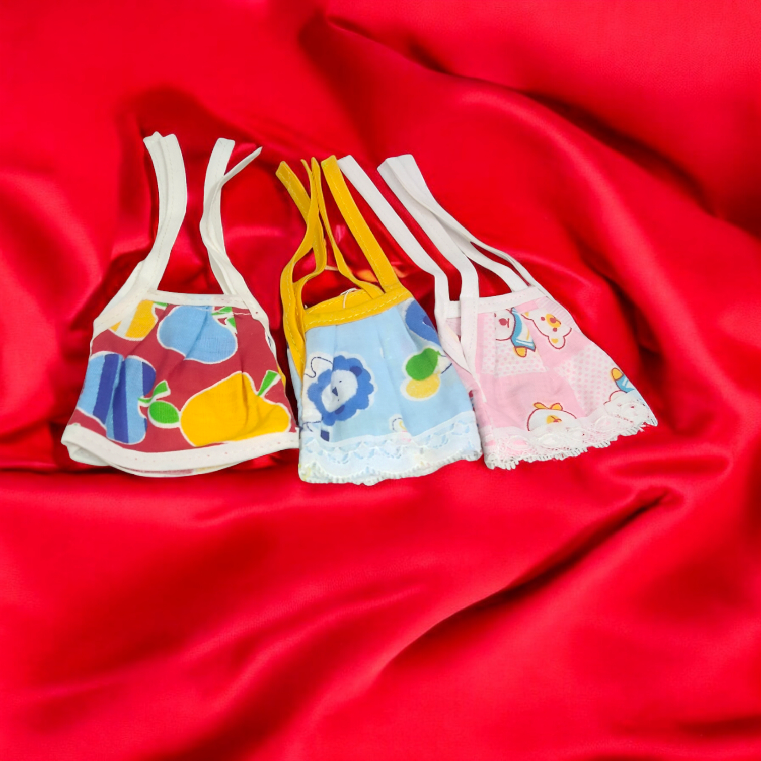 A set of 3 Laddu Gopal Jhabla dresses made from soft cotton fabric, perfect for 0-1 No. size Laddu Gopal idols.