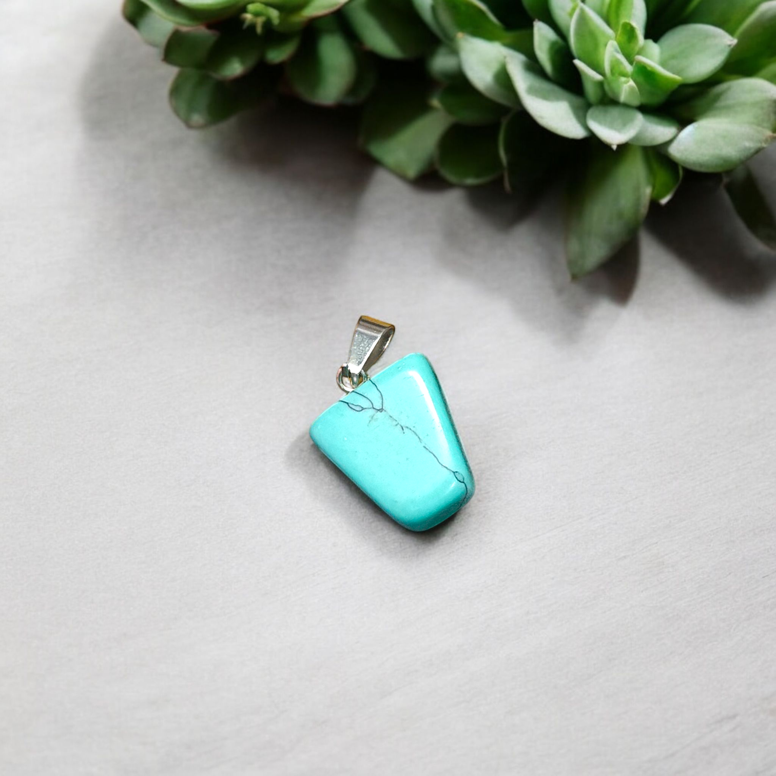 A set of Hit Turquoise Blue Howlite tumbled stones, featuring a mix of turquoise and white veins