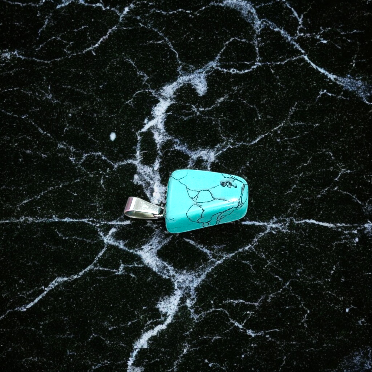 A set of Hit Turquoise Blue Howlite tumbled stones, featuring a mix of turquoise and white veins