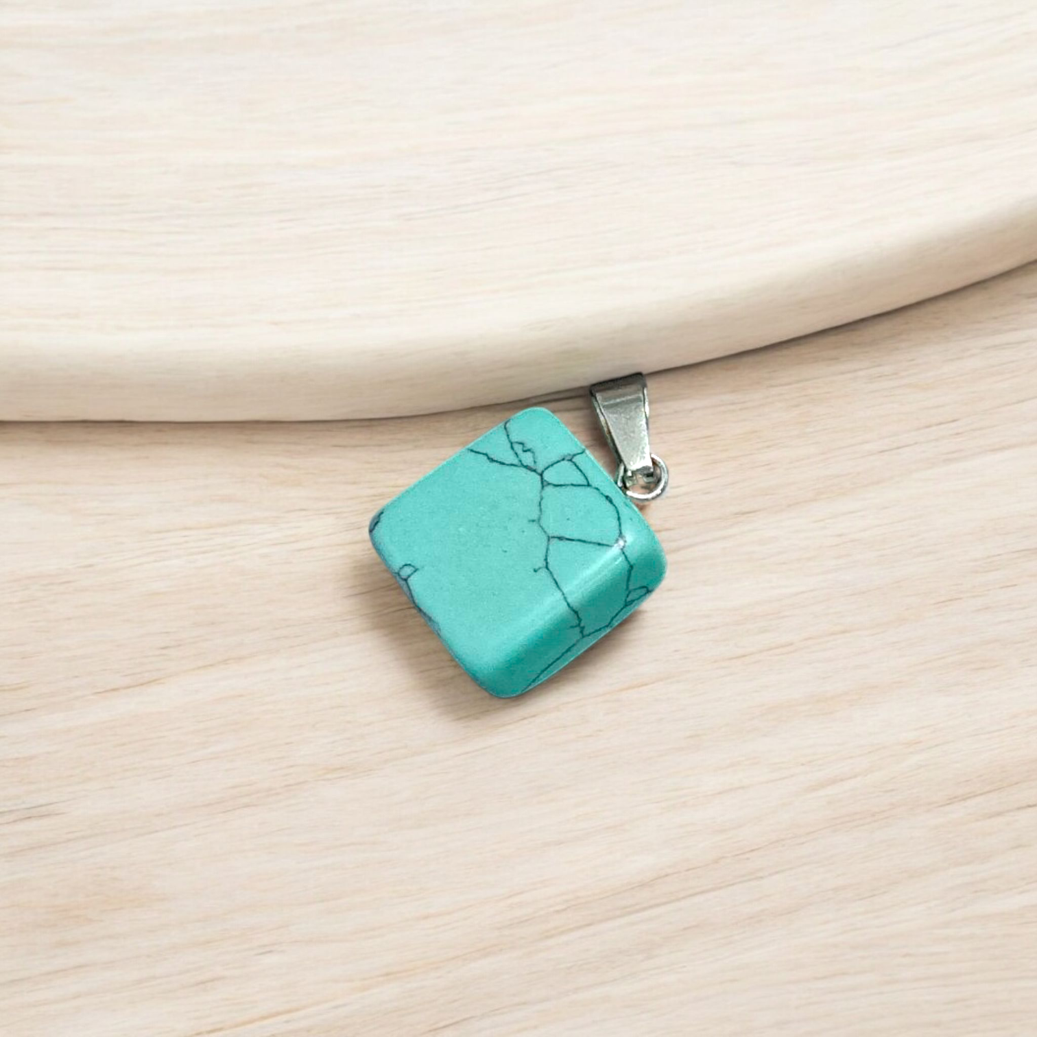 A set of Hit Turquoise Blue Howlite tumbled stones, featuring a mix of turquoise and white veins