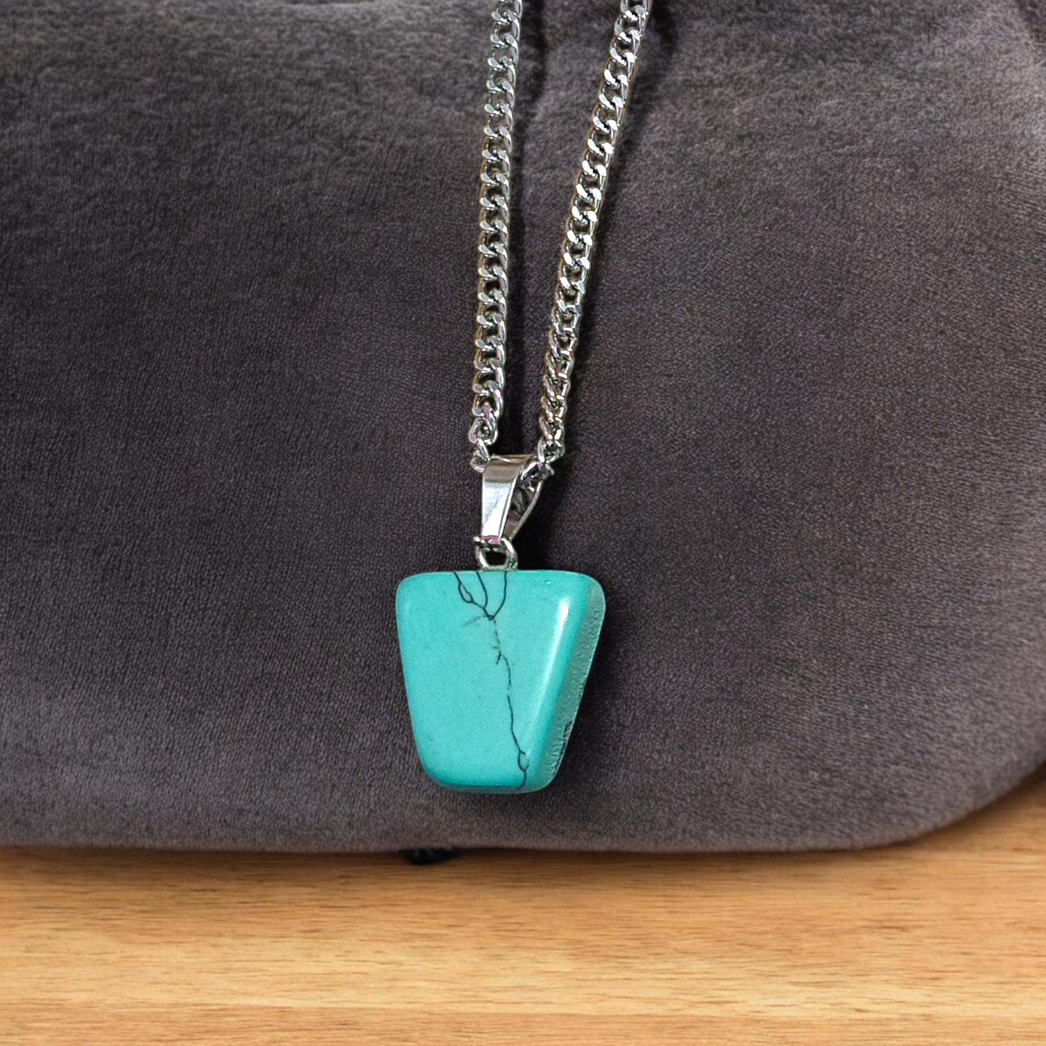 A set of Hit Turquoise Blue Howlite tumbled stones, featuring a mix of turquoise and white veins