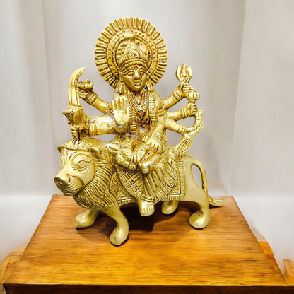 A set of three beautifully handcrafted brass idols representing Maa Durga, Sherwali Mata, and Maa Vaishno Devi, each symbolizing divine power and blessings.