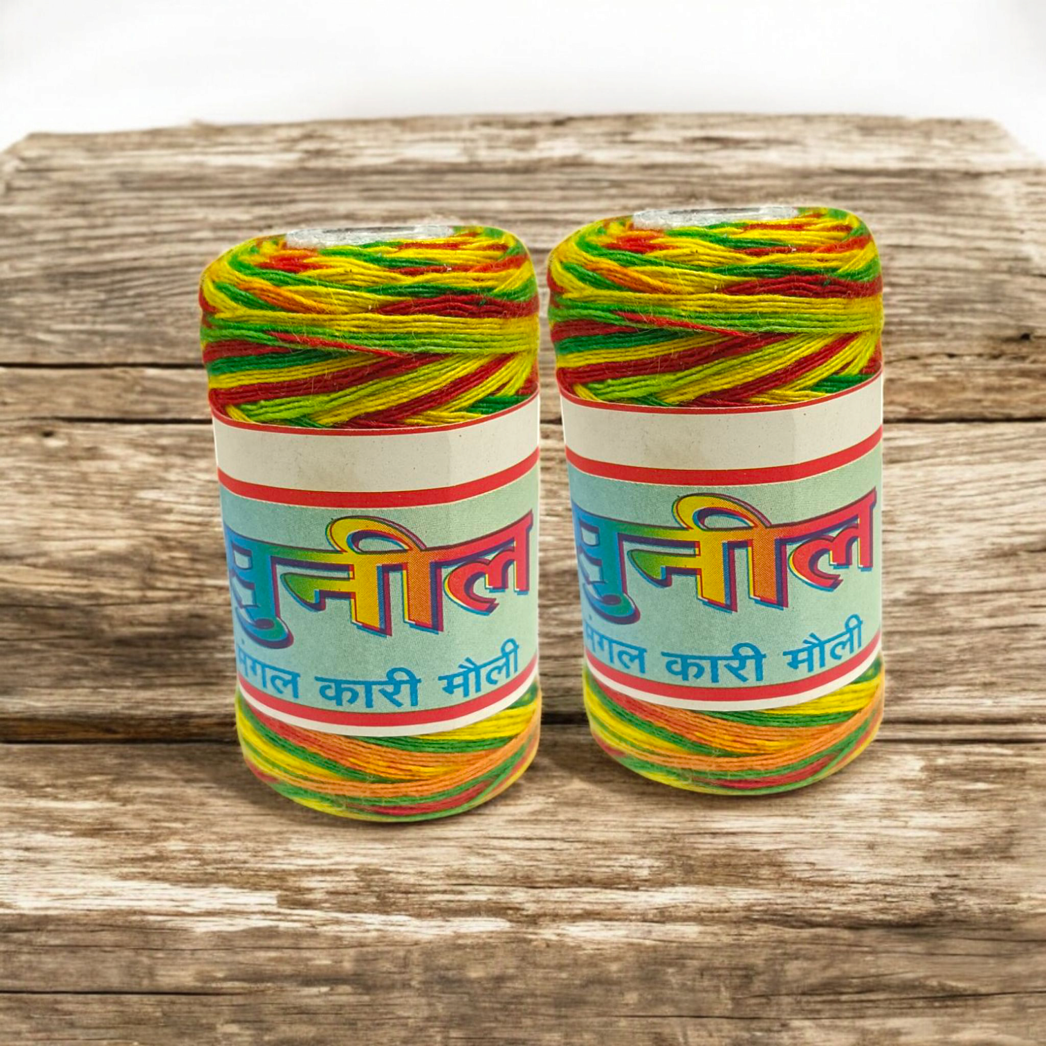 A set of vibrant colored Moli Dhaga threads tied in a bundle, ideal for religious ceremonies and spiritual protection.