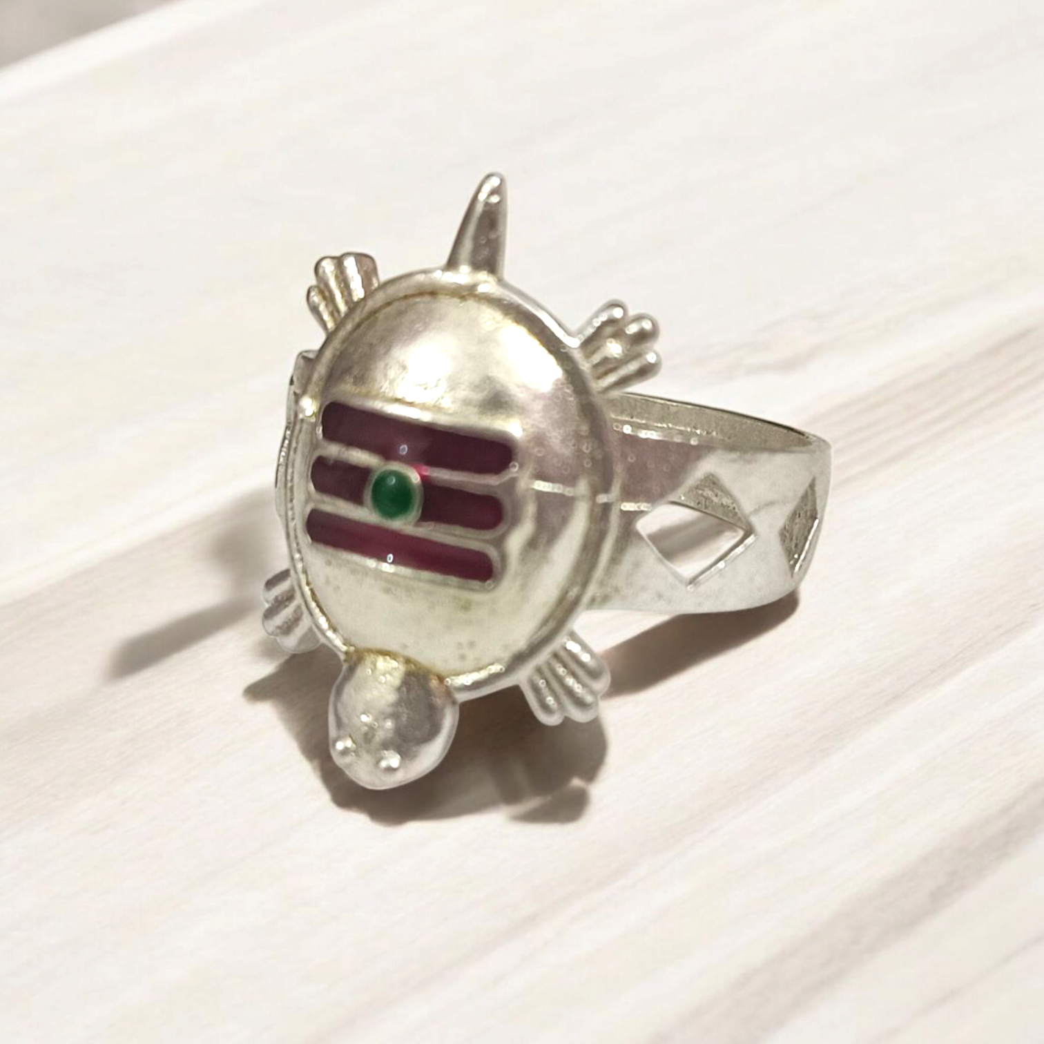 A silver-plated Tripund Kachua Ring, with a detailed Tripund symbol, designed for spiritual protection and strength.