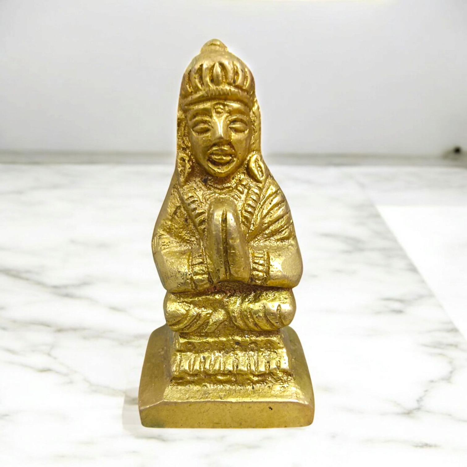 A small brass Parvati Mata Murti idol, intricately designed with a divine representation of Maa Parvati, ideal for worship and spiritual practices.