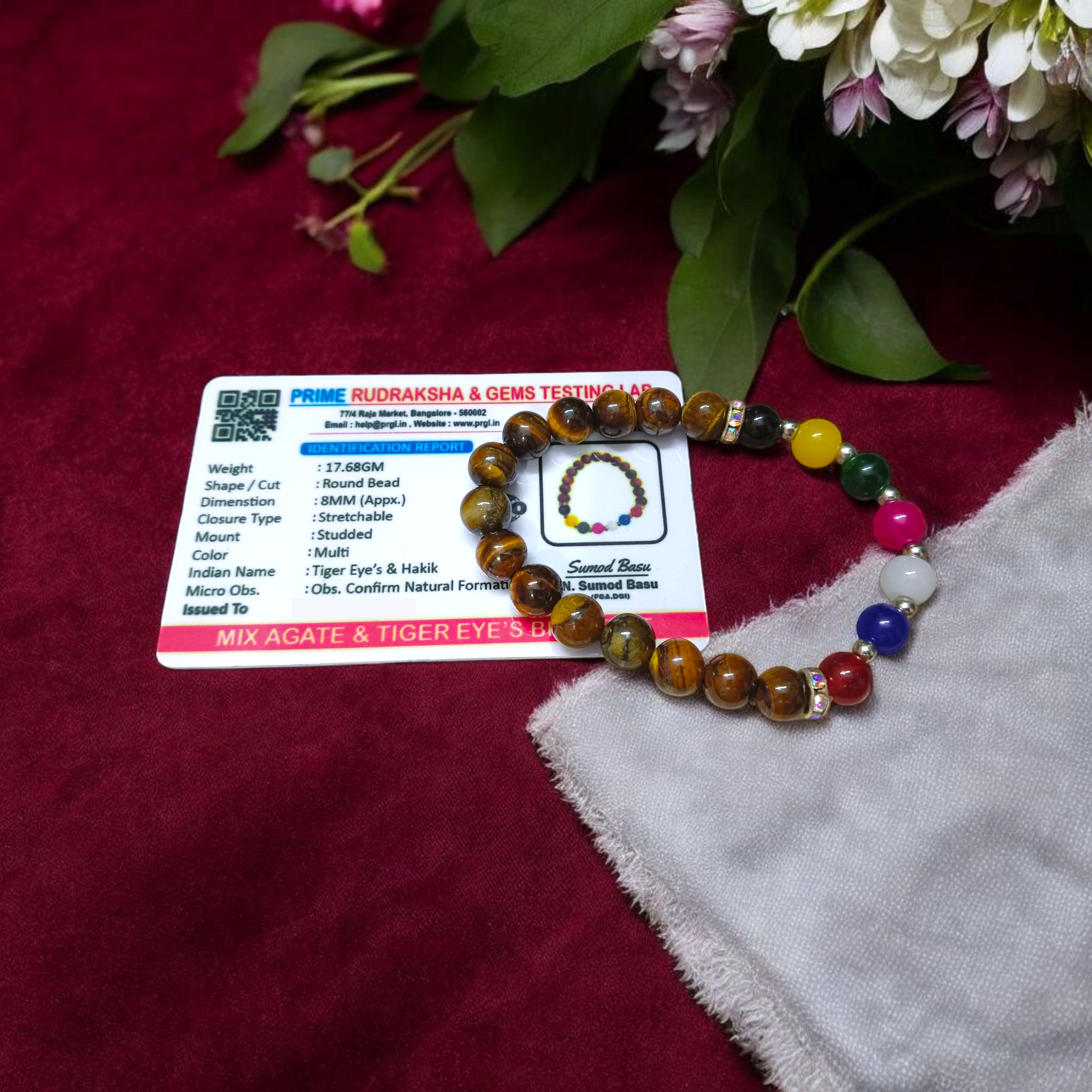 A stretchable bracelet made with 7 types of agate stones (Hakik) and natural Tiger Eye beads, featuring 8mm polished stones—perfect for protection, focus, and healing