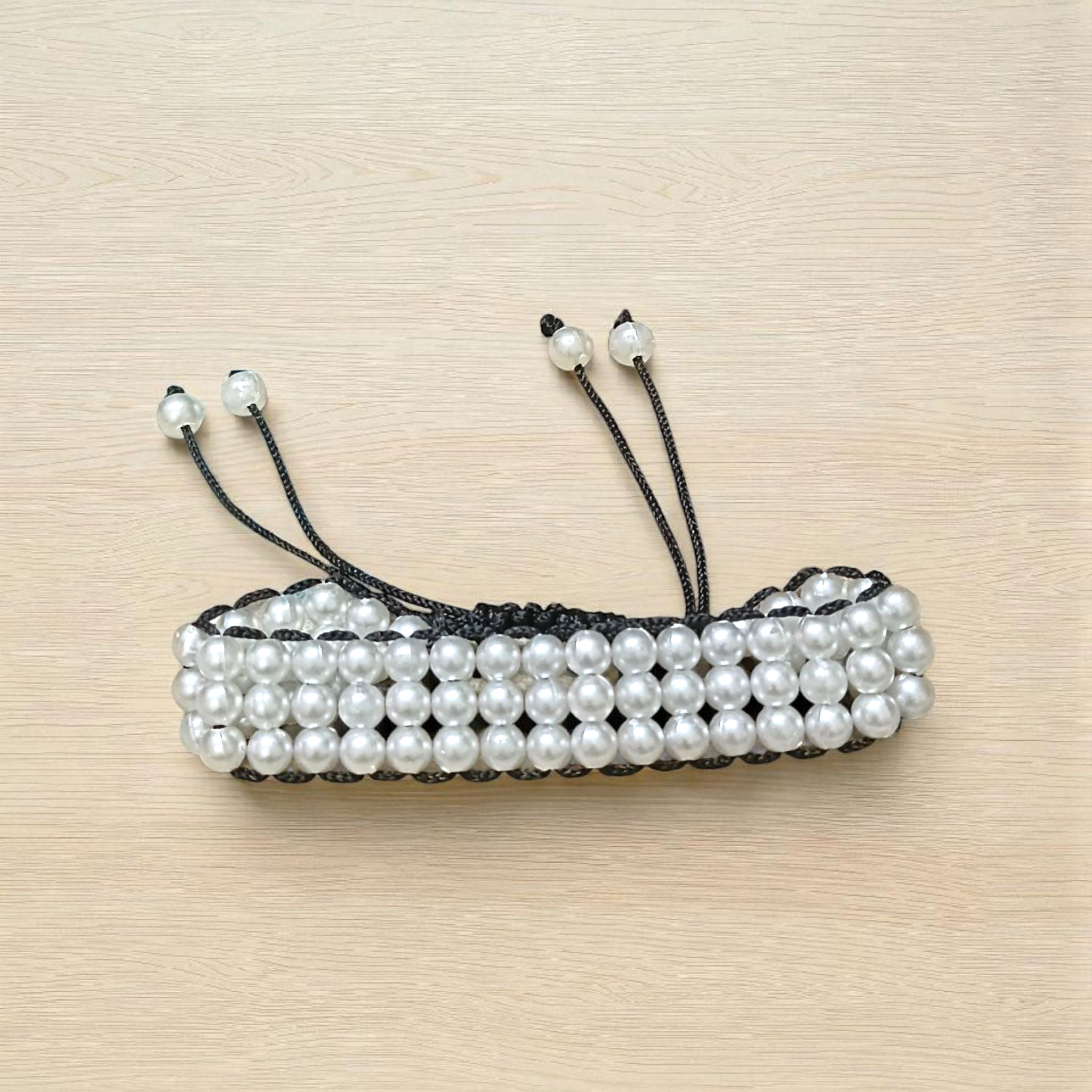 A stretchable white pearl (motii) bracelet with a timeless design, symbolizing purity, peace, and elegance – perfect for emotional balance and spiritual healing