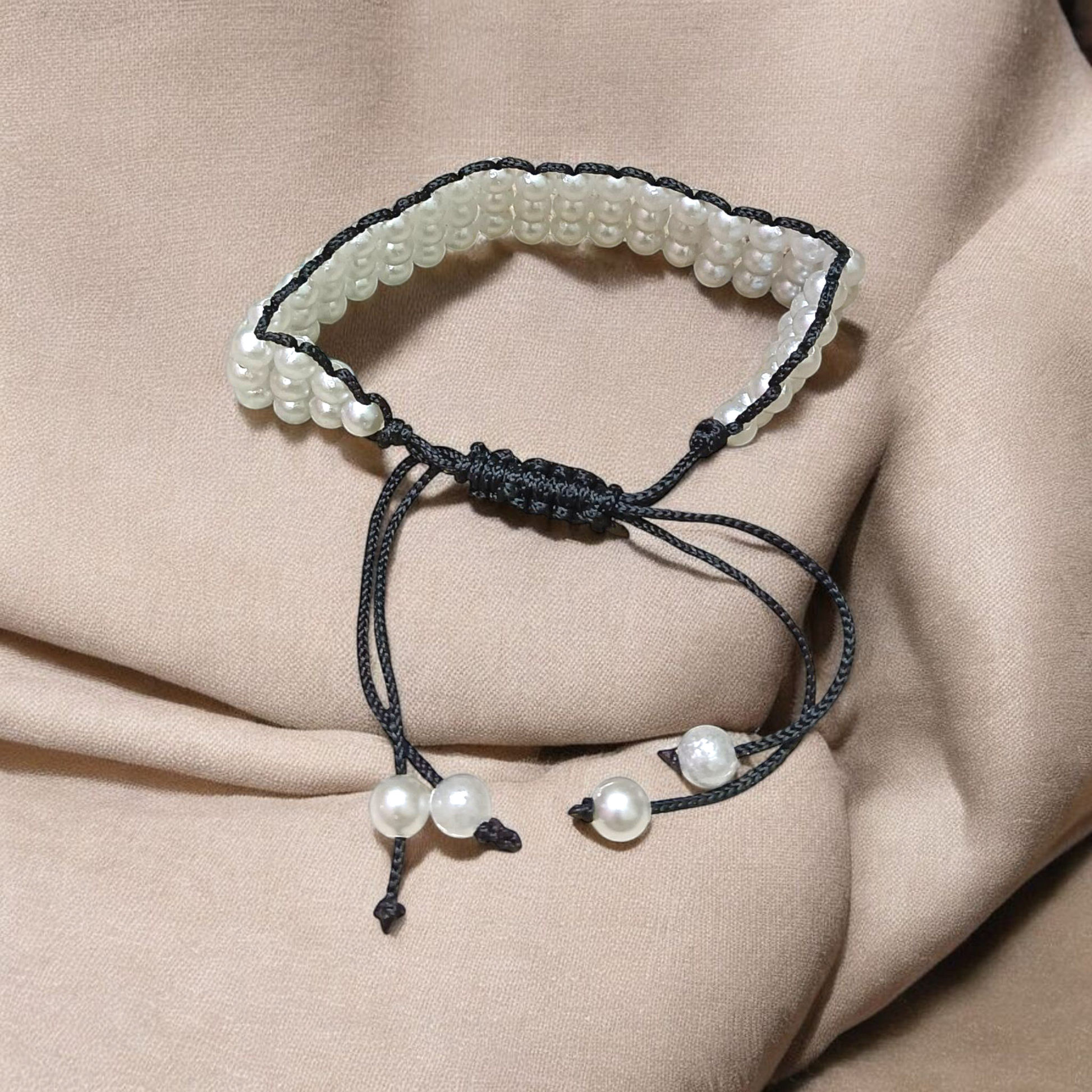 A stretchable white pearl (motii) bracelet with a timeless design, symbolizing purity, peace, and elegance – perfect for emotional balance and spiritual healing