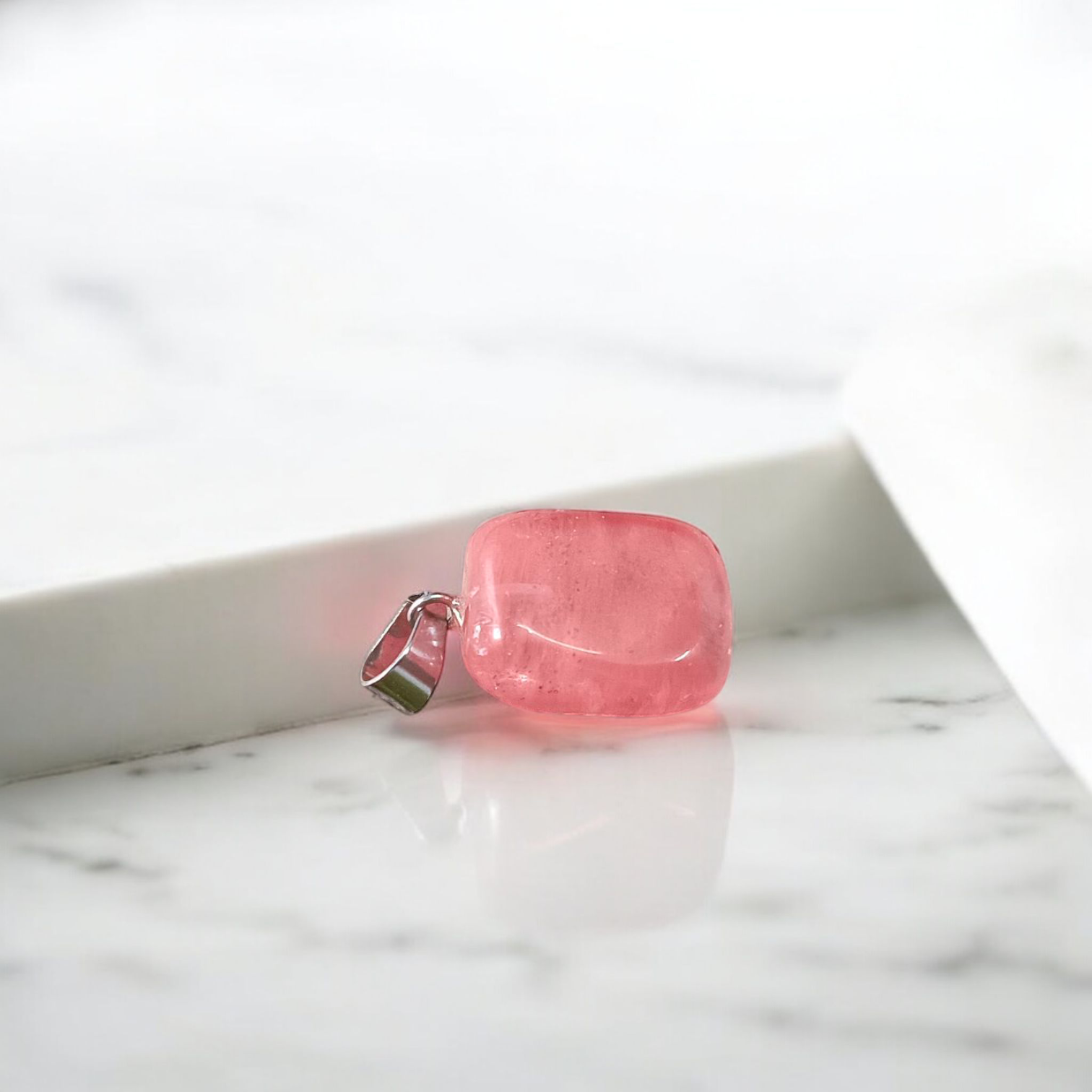 A stunning Rose Quartz Tumble Stone Pendant, lab-certified for authenticity, symbolizing love, healing, and positive energy