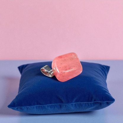 A stunning Rose Quartz Tumble Stone Pendant, lab-certified for authenticity, symbolizing love, healing, and positive energy