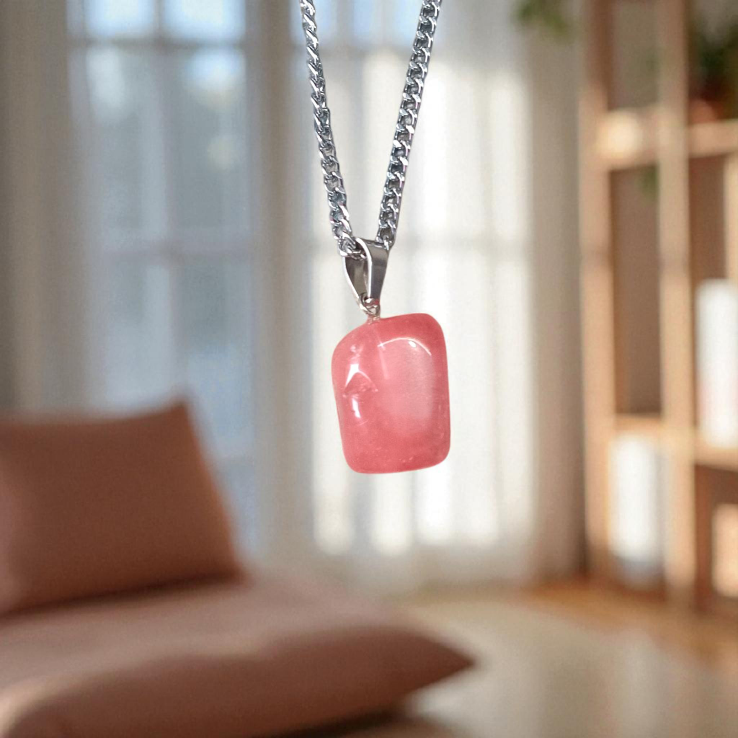 A stunning Rose Quartz Tumble Stone Pendant, lab-certified for authenticity, symbolizing love, healing, and positive energy